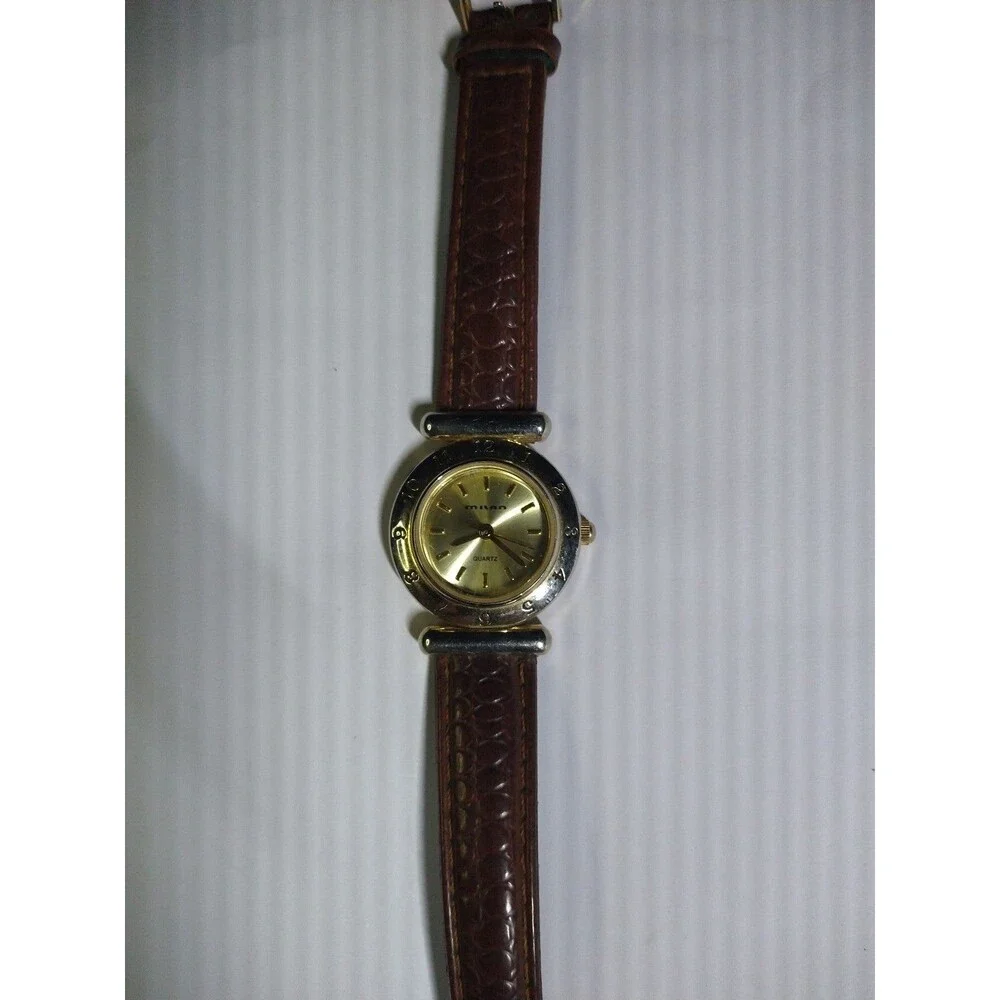 milano gold tone watch for women